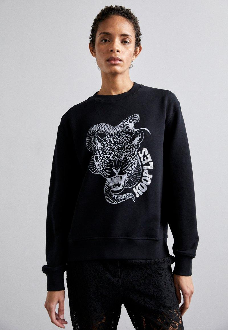 Sweatshirt imprimé léopard